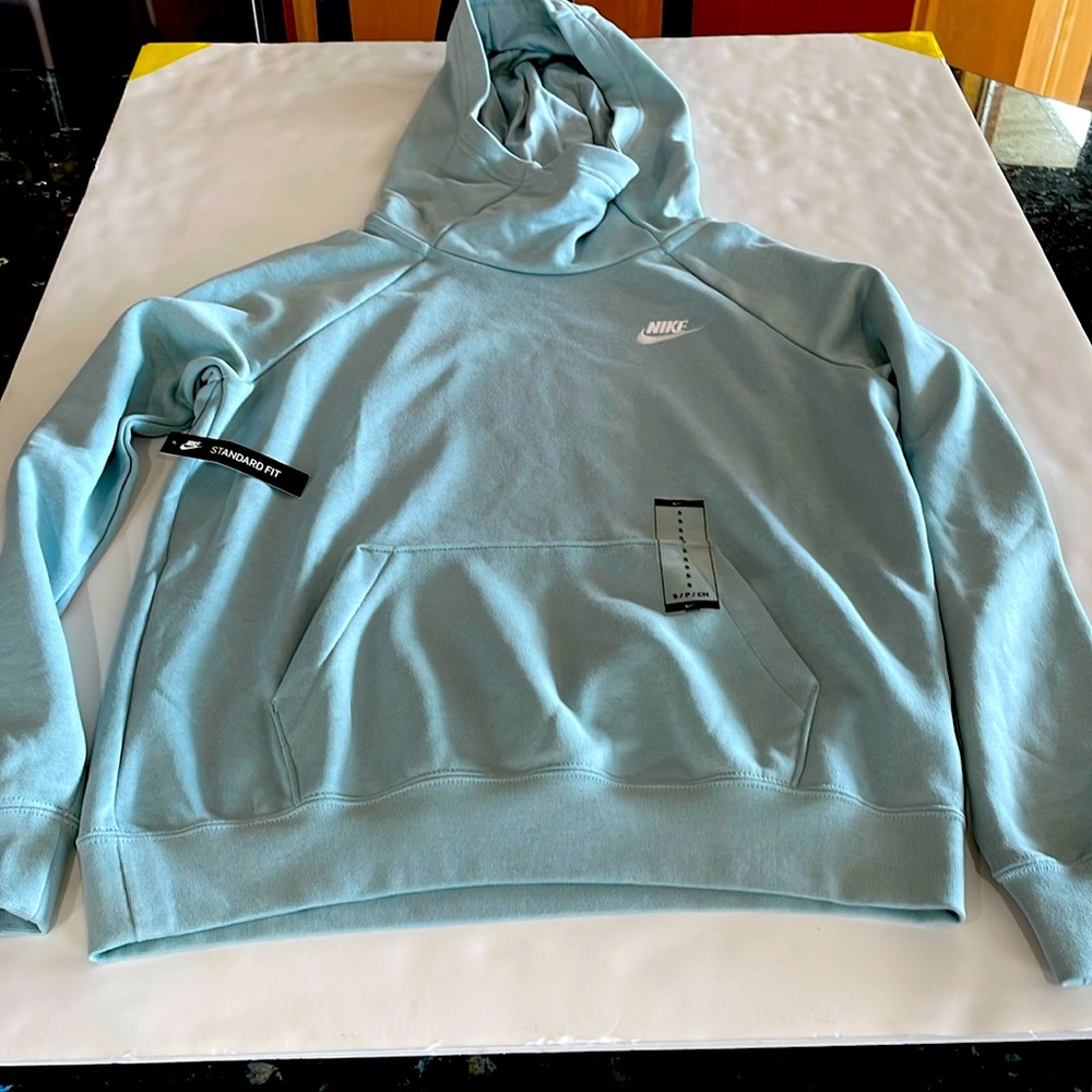 Brand new Nike sweatshirt, size small.